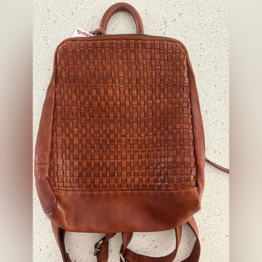 Vilenca Holland leather woven backpack style purse. Woven leather, caramel color